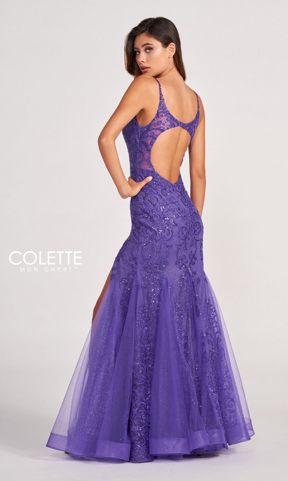 A woman models the Colette CL2024 Sequin-Lace Cut-Out Long Prom Dress—a sleeveless, floor-length purple gown with intricate beading, low back, and side cutouts—standing against a plain background.
